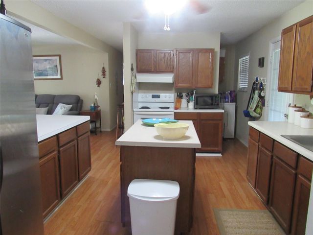 242 Sir Lancelot Drive N, Sargent, TX 77414