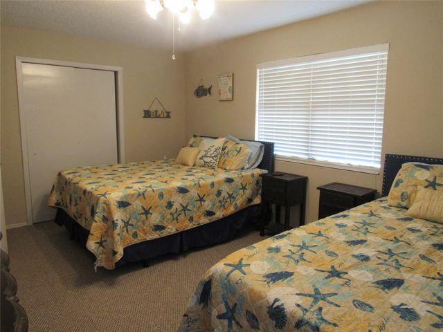 242 Sir Lancelot Drive N, Sargent, TX 77414