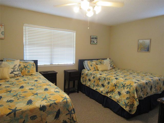 242 Sir Lancelot Drive N, Sargent, TX 77414
