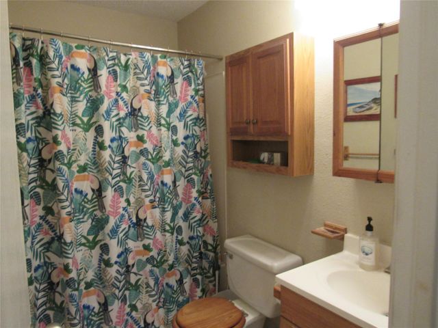 242 Sir Lancelot Drive N, Sargent, TX 77414