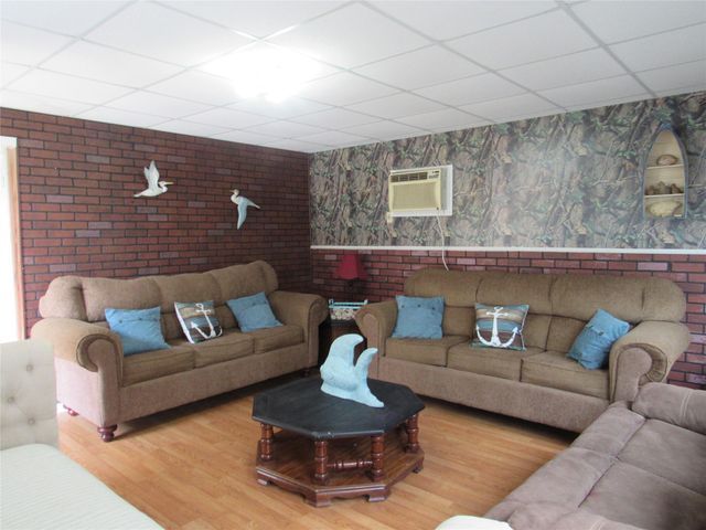 242 Sir Lancelot Drive N, Sargent, TX 77414