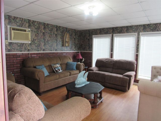 242 Sir Lancelot Drive N, Sargent, TX 77414
