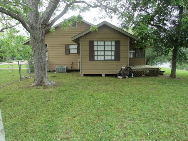 242 Sir Lancelot Drive N, Sargent, TX 77414