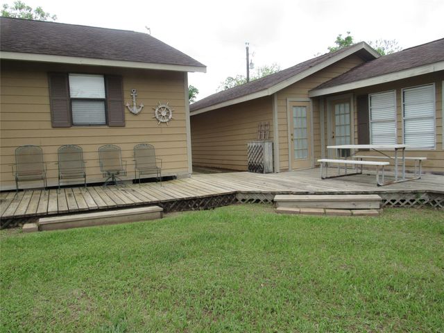 242 Sir Lancelot Drive N, Sargent, TX 77414