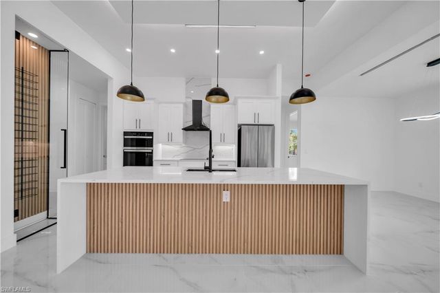 704 Clayton AVE, Lehigh Acres, FL 33972