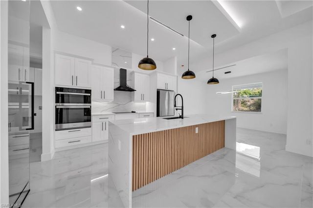 704 Clayton AVE, Lehigh Acres, FL 33972