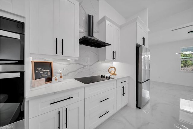 704 Clayton AVE, Lehigh Acres, FL 33972