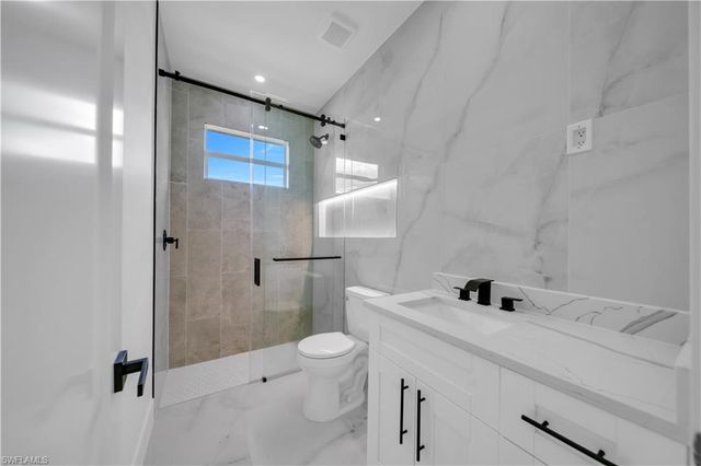 704 Clayton AVE, Lehigh Acres, FL 33972