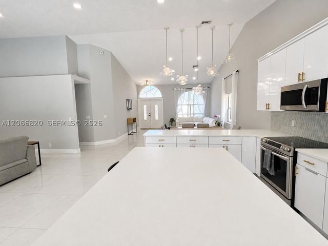 12484 SW 1st St, Coral Springs, FL 33071