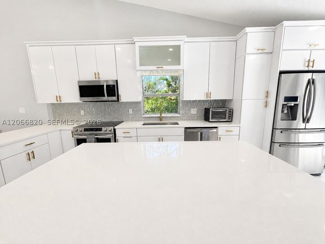 12484 SW 1st St, Coral Springs, FL 33071