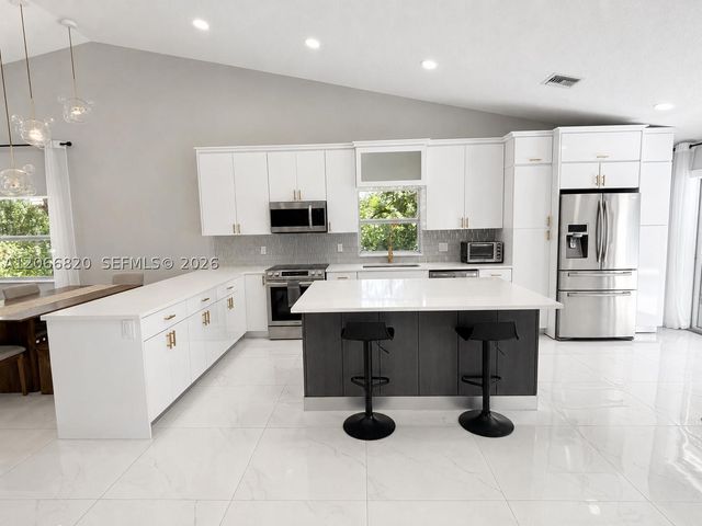 12484 SW 1st St, Coral Springs, FL 33071