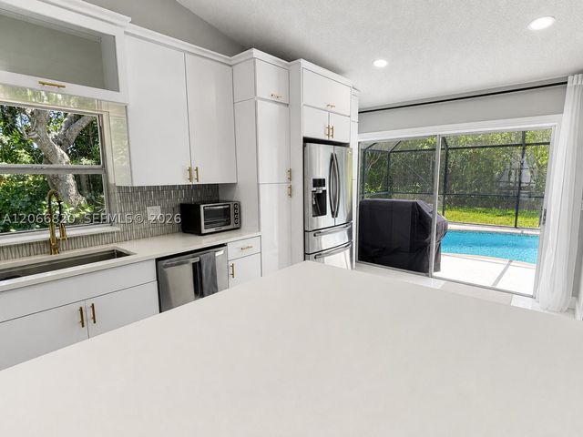 12484 SW 1st St, Coral Springs, FL 33071