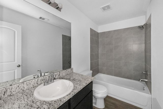 12998 Sorrento Bay Drive, Willis, TX 77318