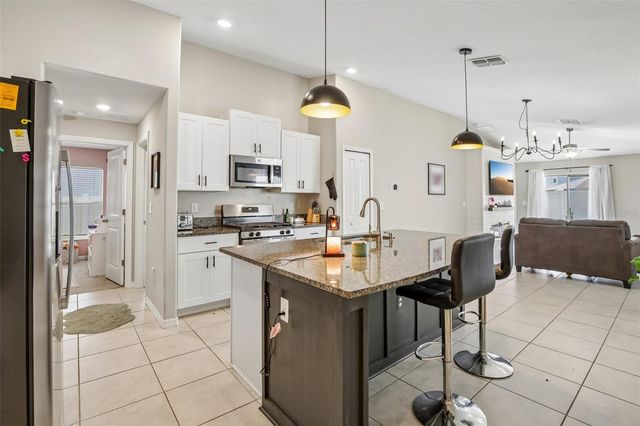 9415 LEMON DROP LOOP, Sun City Center, FL 33573