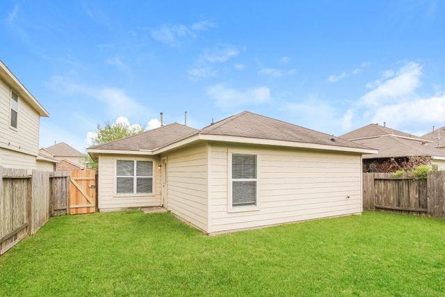 21106 Wortham Oaks Drive, Humble, TX 77338