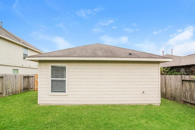 21106 Wortham Oaks Drive, Humble, TX 77338