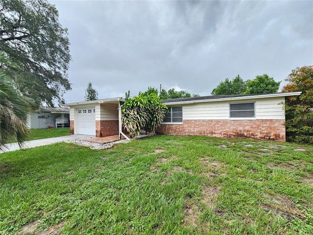 1702 AQUA LANE, Holiday, FL 34691