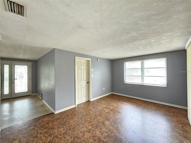 1702 AQUA LANE, Holiday, FL 34691