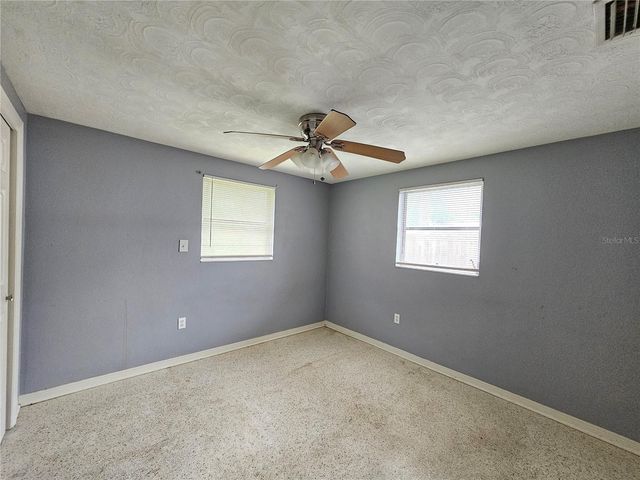 1702 AQUA LANE, Holiday, FL 34691