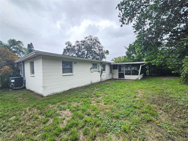 1702 AQUA LANE, Holiday, FL 34691