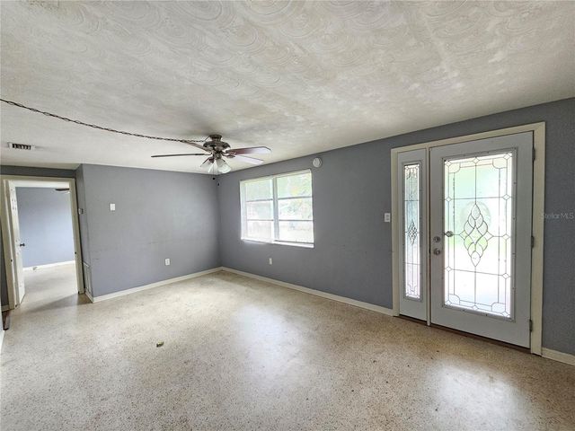 1702 AQUA LANE, Holiday, FL 34691