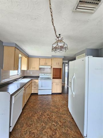 1702 AQUA LANE, Holiday, FL 34691