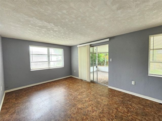 1702 AQUA LANE, Holiday, FL 34691