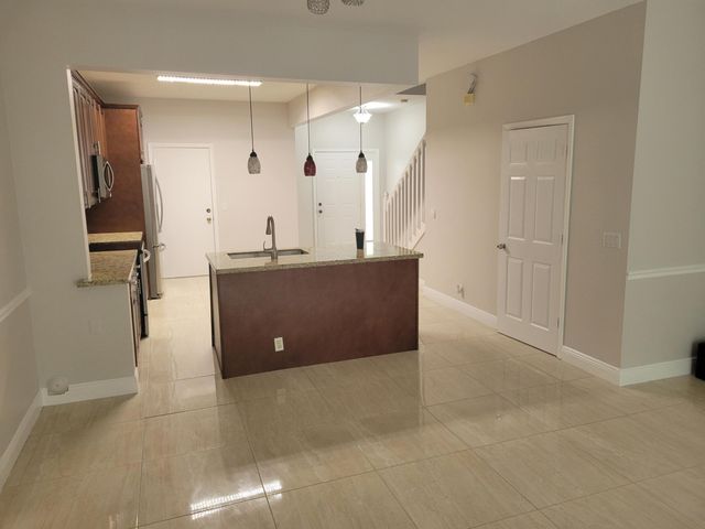 1042 Woodfield Road, Greenacres, FL 33415