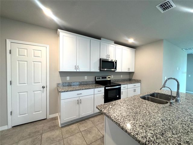 493 SUN WARBLER WAY, St Cloud, FL 34771