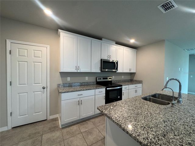 493 SUN WARBLER WAY, St Cloud, FL 34771