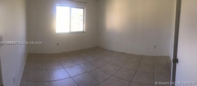 945 NE 33rd Ter 203, Homestead, FL 33033