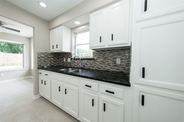 9607 Rumbling Wood Lane, Houston, TX 77086