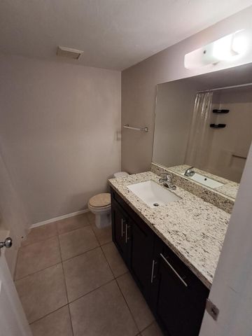 104 Palm Beach Trace Drive, Royal Palm Beach, FL 33411