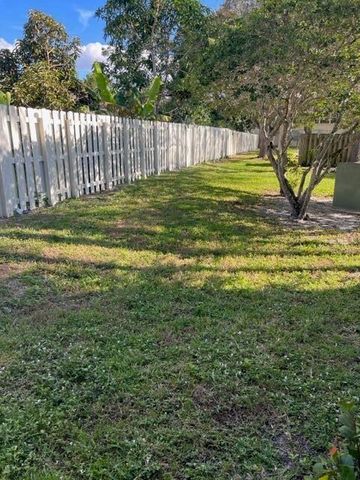 104 Palm Beach Trace Drive, Royal Palm Beach, FL 33411