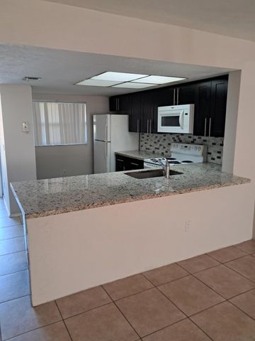 104 Palm Beach Trace Drive, Royal Palm Beach, FL 33411