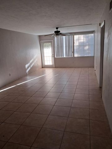 104 Palm Beach Trace Drive, Royal Palm Beach, FL 33411