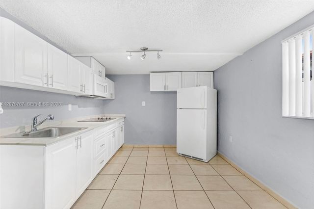 6049 W 14th Court, Hialeah, FL 33012