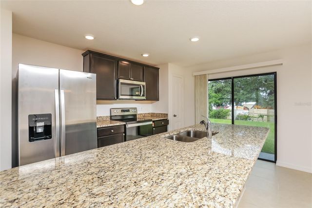 35669 ROSE MOSS AVENUE, Leesburg, FL 34788