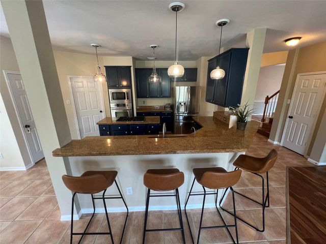 26 Merit Woods Place, The Woodlands, TX 77382