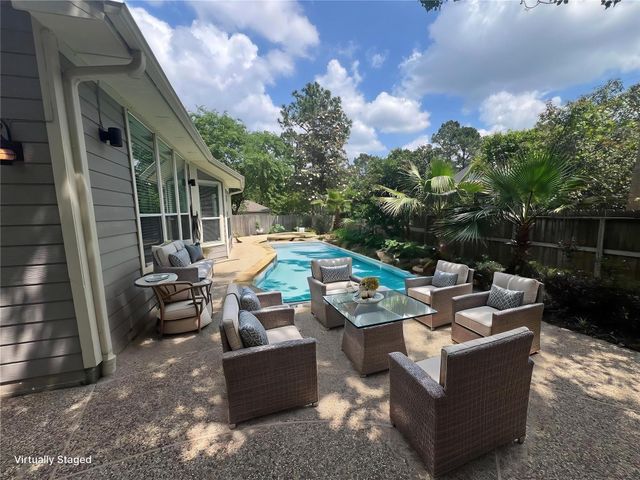 26 Merit Woods Place, The Woodlands, TX 77382