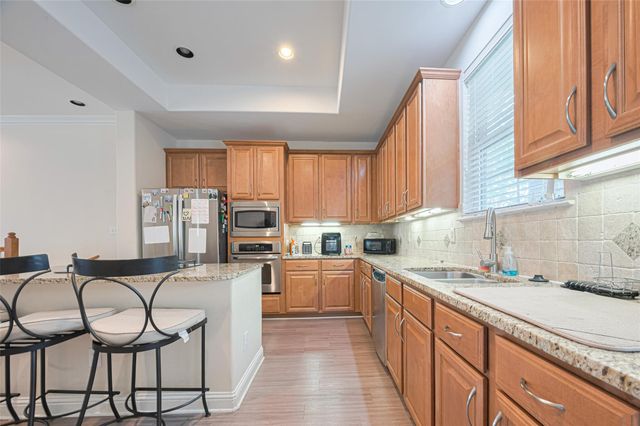 24 Versante Court, Houston, TX 77070