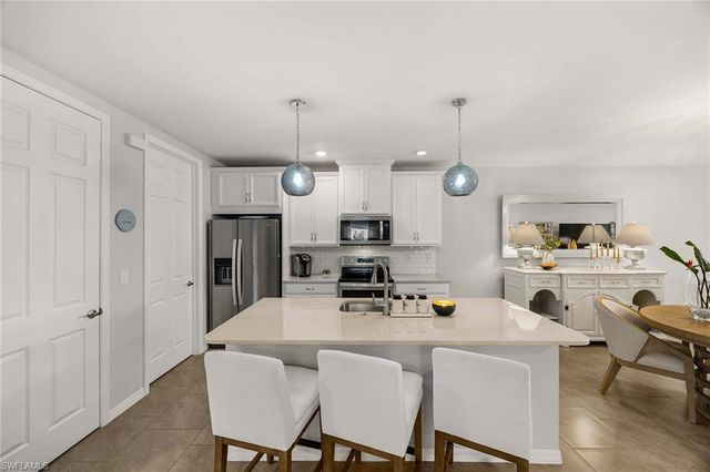 14610 Edgewater CIR, Naples, FL 34114