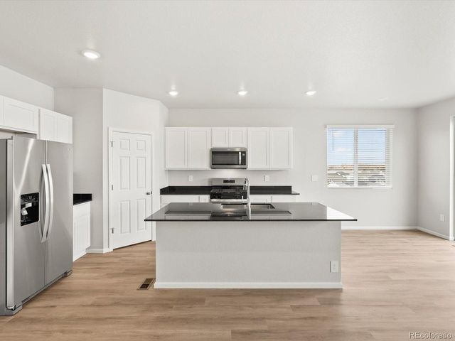 1242 Spring Creek Dr, Windsor, CO 80550