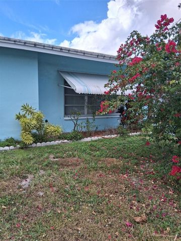 5709 NW 87th Avenue, Tamarac, FL 33321