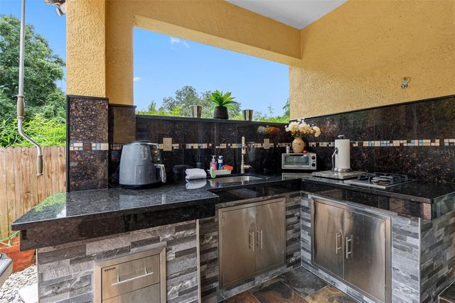 10407 N WOODMERE ROAD, Tampa, FL 33617