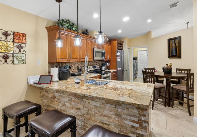 10407 N WOODMERE ROAD, Tampa, FL 33617