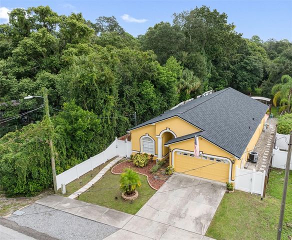 10407 N WOODMERE ROAD, Tampa, FL 33617