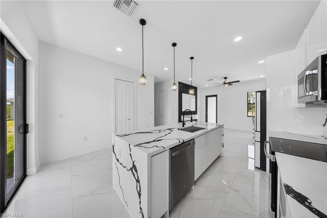 1213 Dodwin ST E, Lehigh Acres, FL 33974