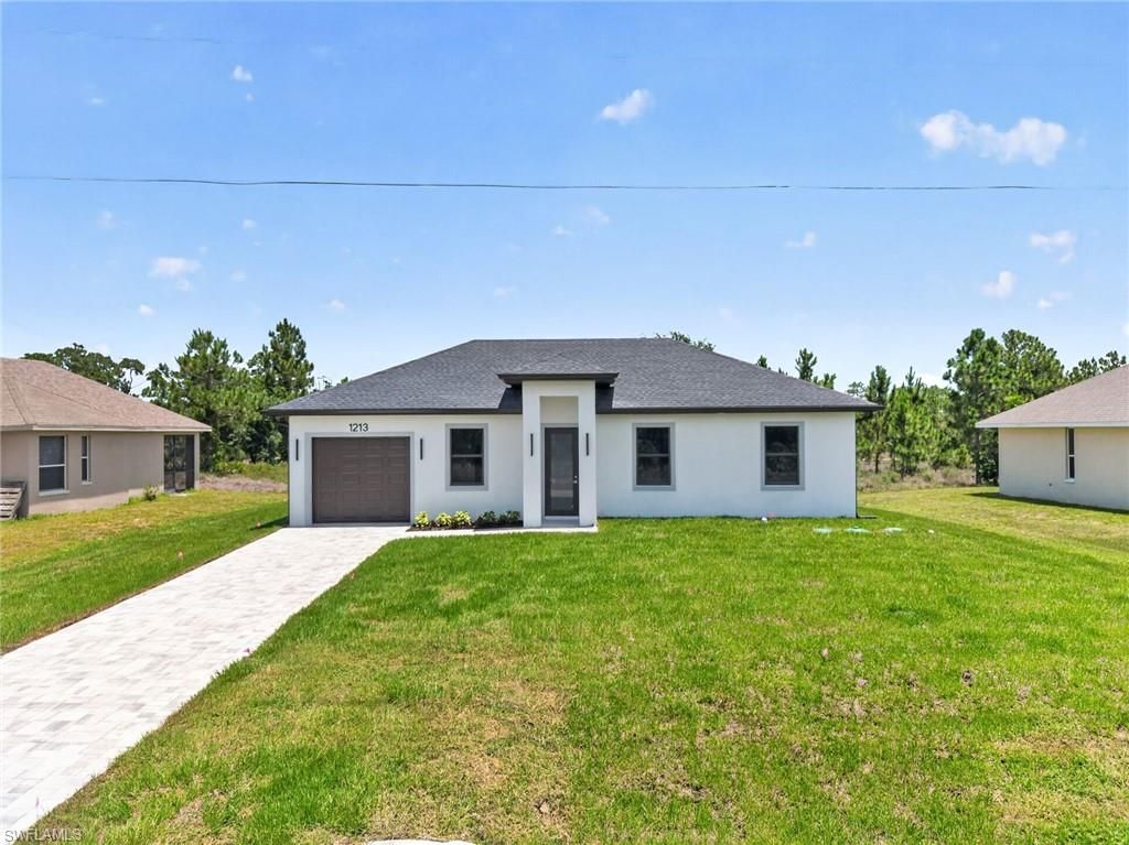 1213 Dodwin ST E, Lehigh Acres, FL 33974