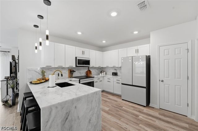 20652 Plumwood LOOP, North Fort Myers, FL 33917